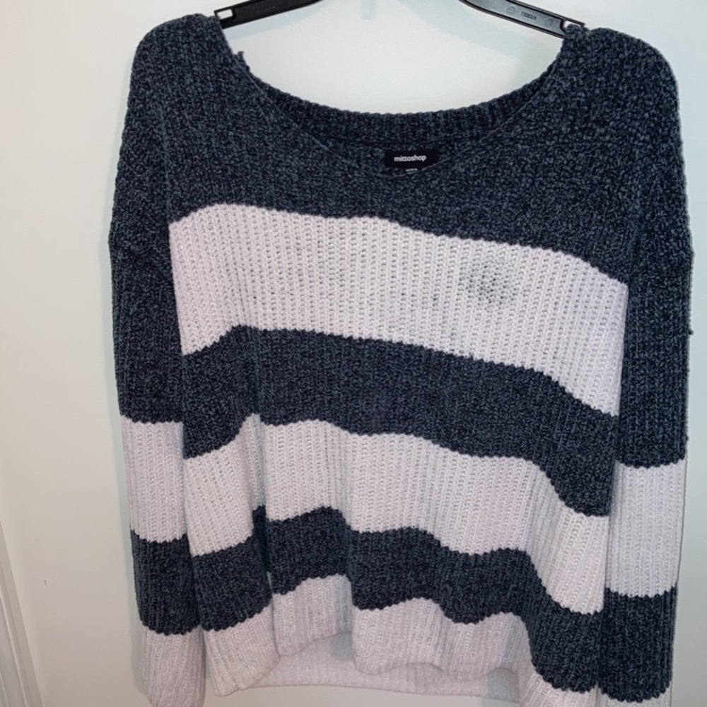 Gray and white sweater